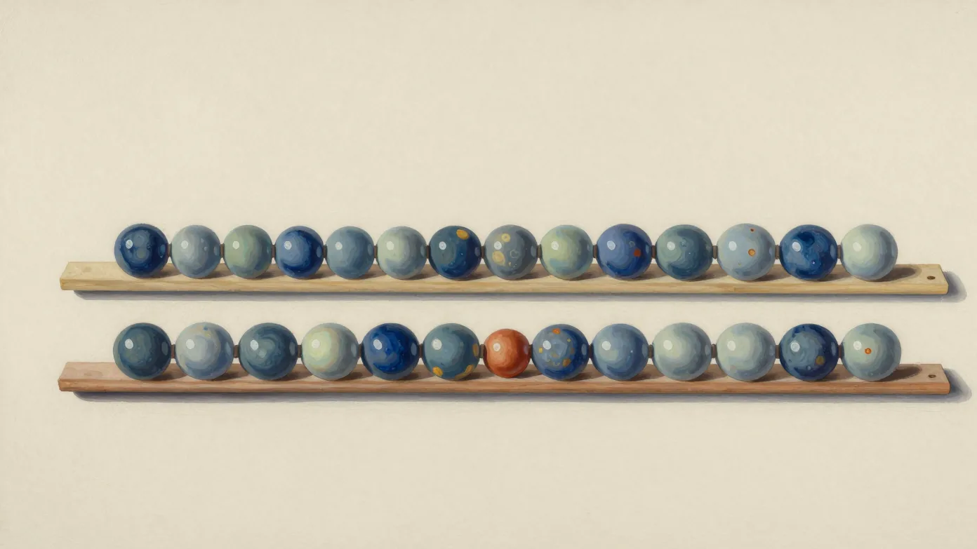 Two rows of blue and pale ceramic beads on wooden guides, with one terracotta bead.