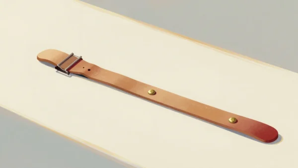 Gouache painting: a long tan leather strap lies straight across a workbench with two brass studs a short gap apart near its middle