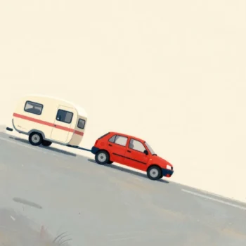 A small car towing a heavy caravan slowly up a steep country lane