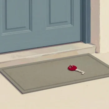 A hand lifts the corner of a doormat to show bare stone and the faint outline where a spare key used to lie.