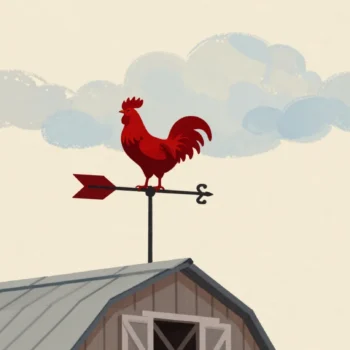 A weather vane with a red rooster turning with the wind on a barn roof