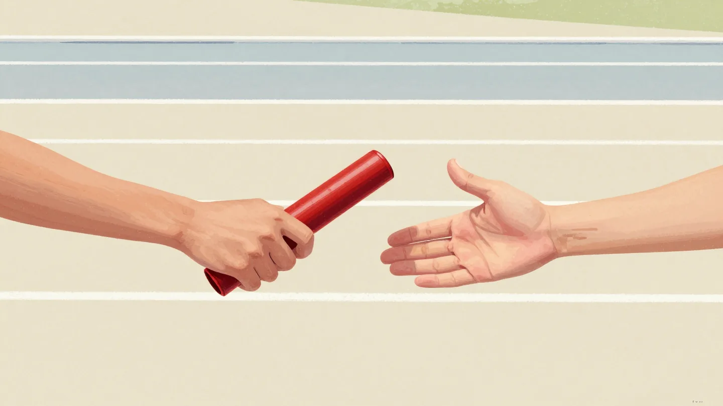 Two hands at a relay baton exchange on a running track, a small gap between the red baton and the open palm