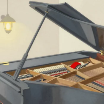 A grand piano with its lid raised, showing the strings and hammers inside, one hammer painted red.