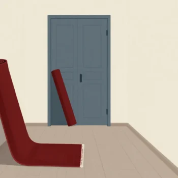 A cleared hallway with rugs rolled up against the wall and a wardrobe just brought in.