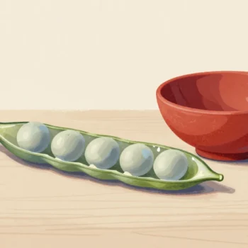 An open pea pod with five peas and an empty stretch at the end beside a red bowl.