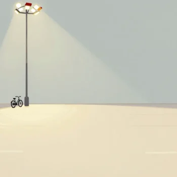 A tall floodlight lighting an entire empty car park at night, one small bicycle standing in a far corner.
