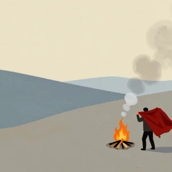 A person lifting a red blanket over a campfire, sending puffs of smoke across a valley at dusk