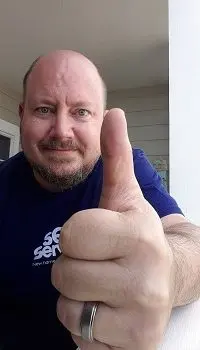 Man giving thumbs up.