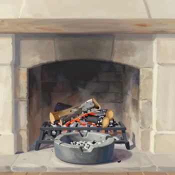 A morning fireplace with last night's ash still shaped on the grate and a full ash pan pulled out