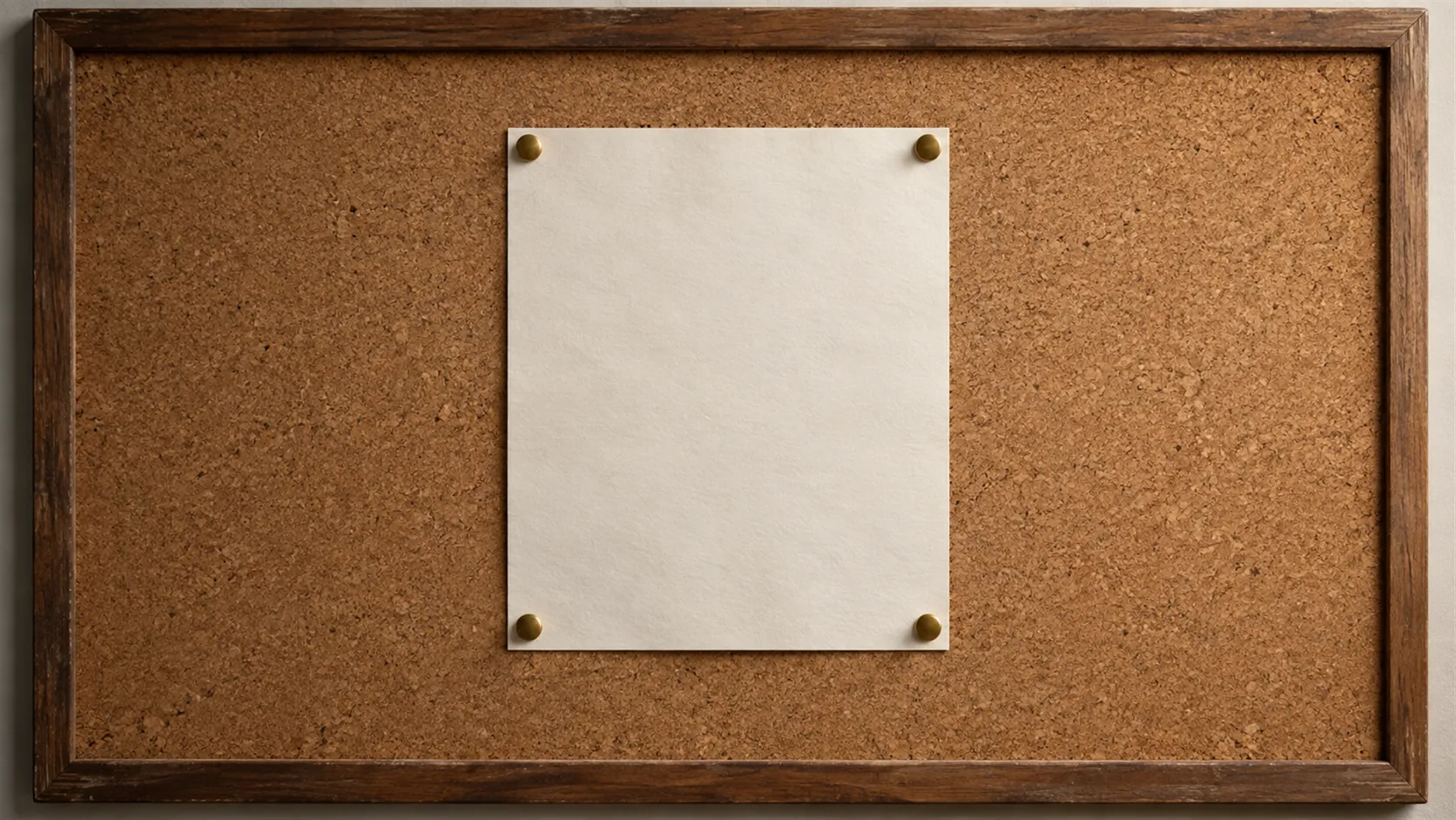 A single sheet pinned dead centre on an otherwise empty cork pinboard
