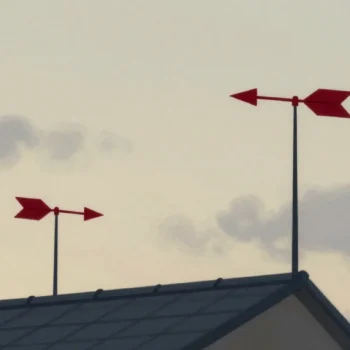 Gouache painting of two weathervanes on one roof pointing opposite ways, one in vermilion