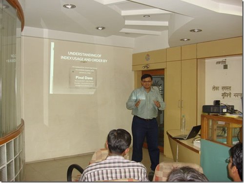 Man giving a presentation at a meeting.