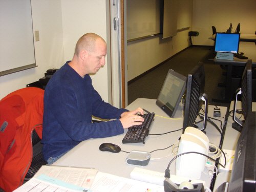 A man working on a computer.