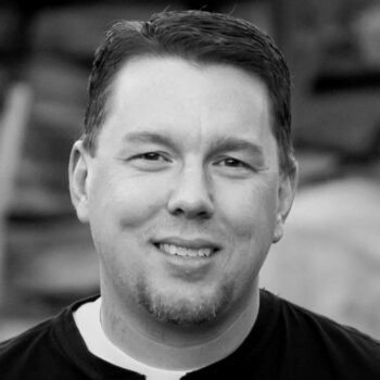 An image of a man smiling.