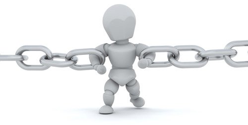 A figure struggles with a chain.