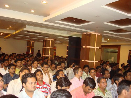 Large crowd in conference room.