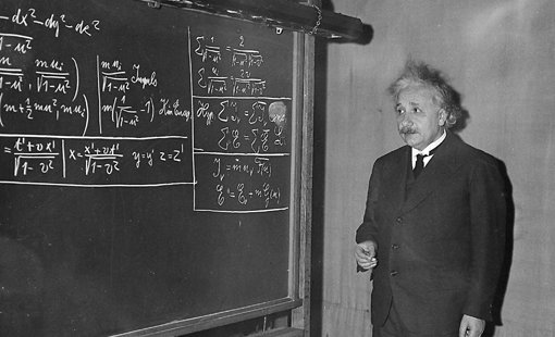 A blackboard with mathematical equations on it.