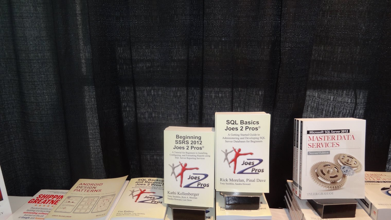 Books displayed at a SQL Server book signing.