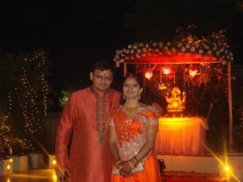 Pinal and Nupur A couple in traditional wedding attire.