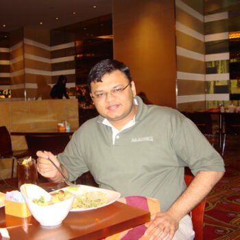Man eating in a restaurant.